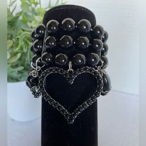 Bracelet Has 3 Stretchy Strands Of Black Beads And Dangling Charms. NWT